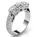 Picture of Three stones diamond ring encrusted with diamonds