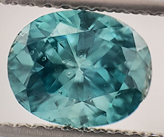 1.01 Carats, Oval Diamond Sky Blue color enhanced, SI1 clarity NOT enhanced