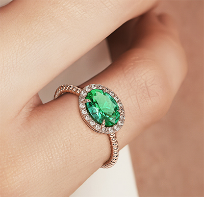 1 1/4 carat Oval Emerald and 1/5 carat diamonds ring