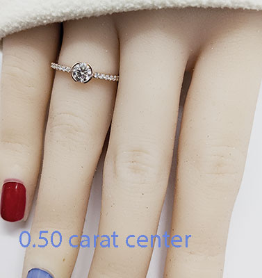 Petit half bezel engagement ring