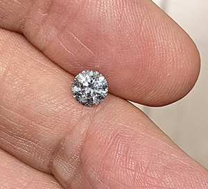 Picture of 0.94 Carats, Round Natural Diamond with Ideal Cut, G Color, I1 Clarity and Certified By CGL