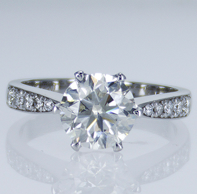 Designers engagement ring with round diamonds