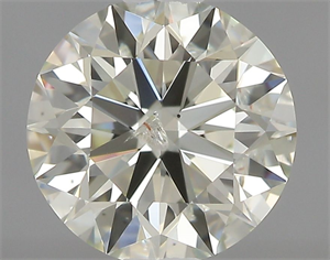 Picture of Natural Diamond 0.73 Carats, Round with Excellent Cut, K Color, SI2 Clarity and Certified by IGI