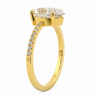 Low profile pear shaped diamond engagement ring