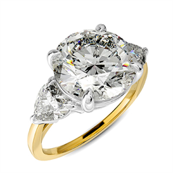 Picture of 3 carat center. Three stone ring with 0.30 carat total weight  side Lab Heart diamonds