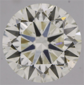 Picture of Natural Diamond 0.60 Carats, Round with Very Good Cut, K Color, SI1 Clarity and Certified by GIA