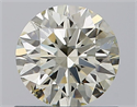 Natural Diamond 0.71 Carats, Round with Excellent Cut, K Color, SI1 Clarity and Certified by IGI