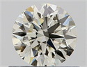 Natural Diamond 0.56 Carats, Round with Excellent Cut, J Color, VS1 Clarity and Certified by IGI