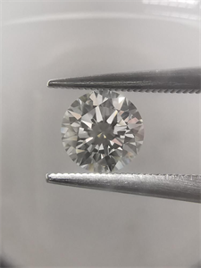 Picture of Natural Diamond 0.40 Carats, Round with Excellent Cut, I Color, VS1 Clarity and Certified by GIA