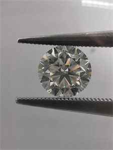 Picture of Natural Diamond 0.51 Carats, Round with Good Cut, J Color, SI1 Clarity and Certified by GIA