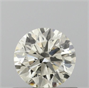 Natural Diamond 0.60 Carats, Round with Excellent Cut, K Color, SI1 Clarity and Certified by IGI